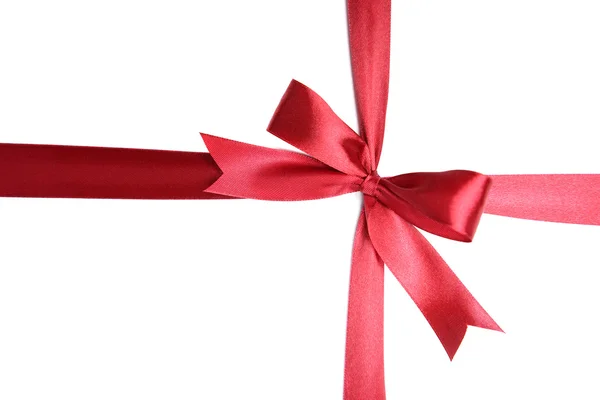 Shiny red ribbon with bow isolated on white — Stock Photo, Image