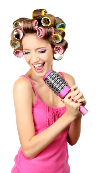 Beautiful girl in hair curlers isolated on white — Stock Photo, Image