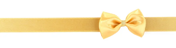 Złote wstążki i łuk — Zdjęcie stockowe