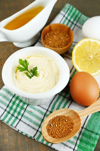 Mayonnaise ingredients on wooden background — Stock Photo, Image