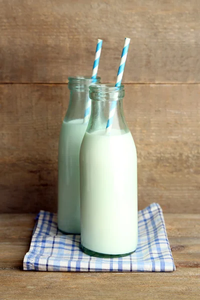 Retro bottles of tasty rustic milk — Stock Photo, Image