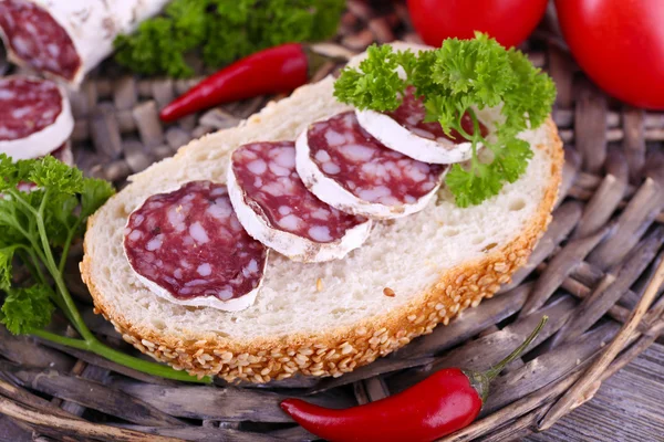 French salami with tomatoes, bread and parsley — Stock Photo, Image