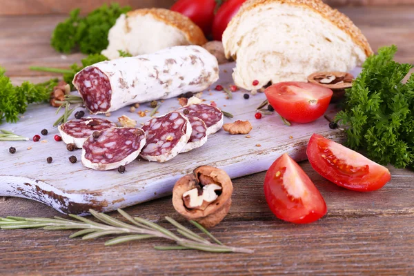 French salami with tomatoes, parsley and bread — Stock Photo, Image