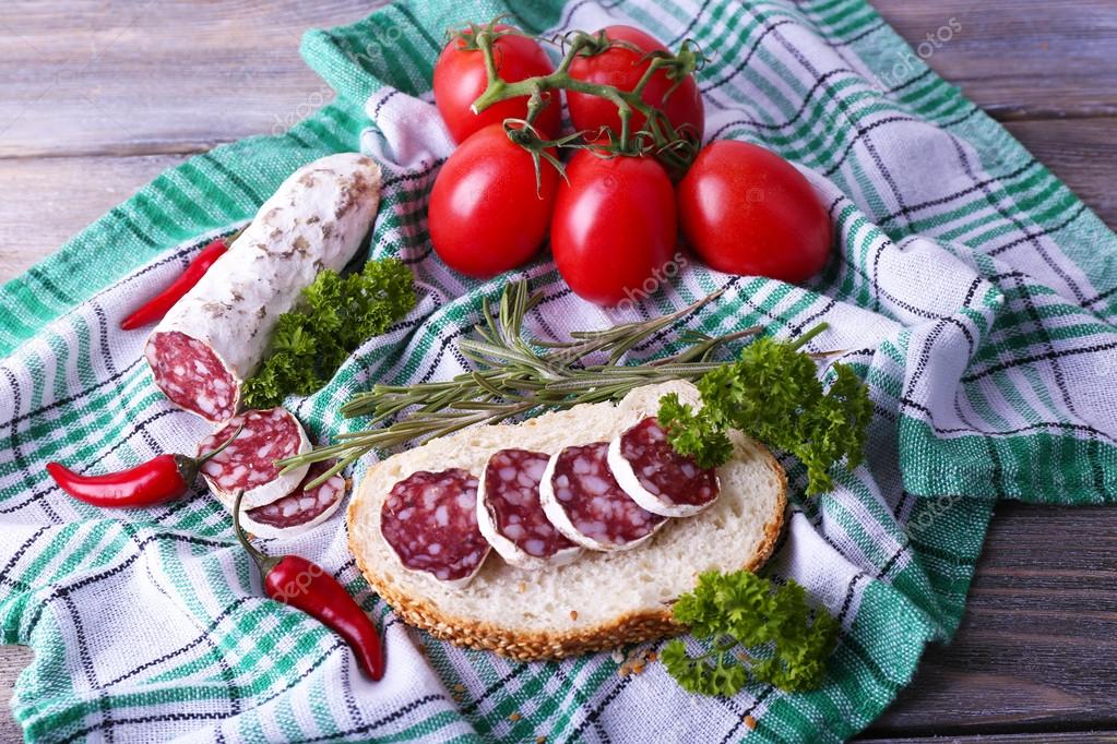 French salami with bread, tomatoes and parsley — Stock Photo