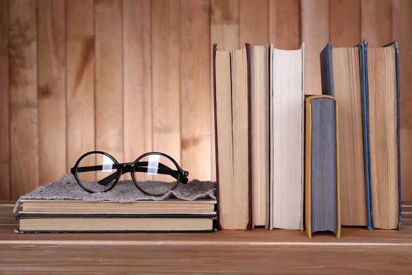 Books on wooden table — Stock Photo, Image