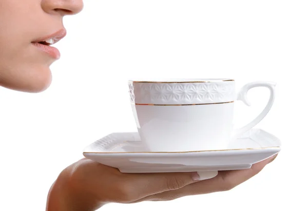 Hermosa joven con taza de café aislado en blanco — Foto de Stock