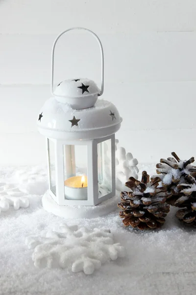 White flash light and Christmas decoration on light background — Stock Photo, Image