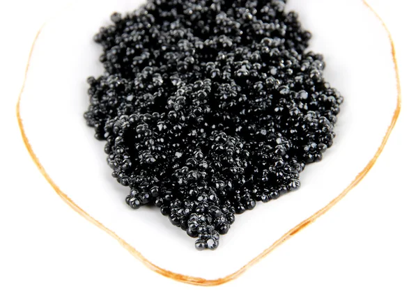 Zwarte kaviaar op plaat geïsoleerd op wit — Stockfoto