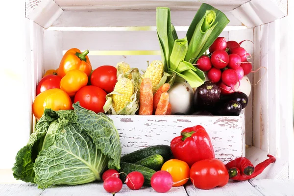 Vegetables in wooden box on white wooden box background — Stock Photo, Image