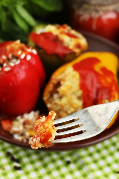 Fork with piece of stuffed pepper — Stock Photo, Image