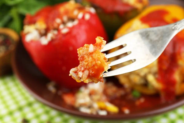 Fork with piece of stuffed pepper — Stock Photo, Image