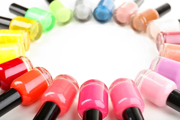 Colorful nail polishes isolated on white — Stock Photo, Image