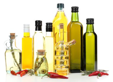 Different sorts of cooking oil, isolated on white clipart