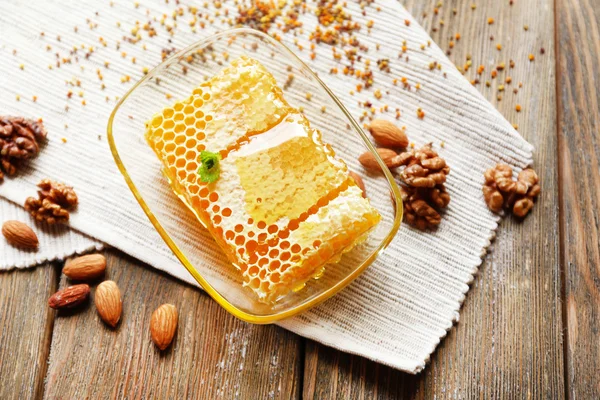 Fresh honey on wooden table — Stock Photo, Image