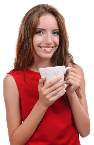 Vacker ung flicka med kopp kaffe på vit bakgrund — Stockfoto