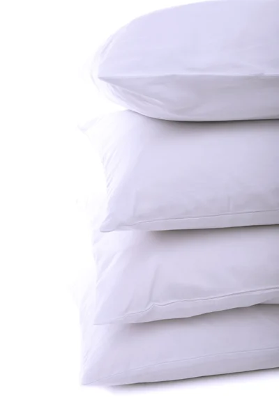 Białe poduszki na białym tle — Zdjęcie stockowe