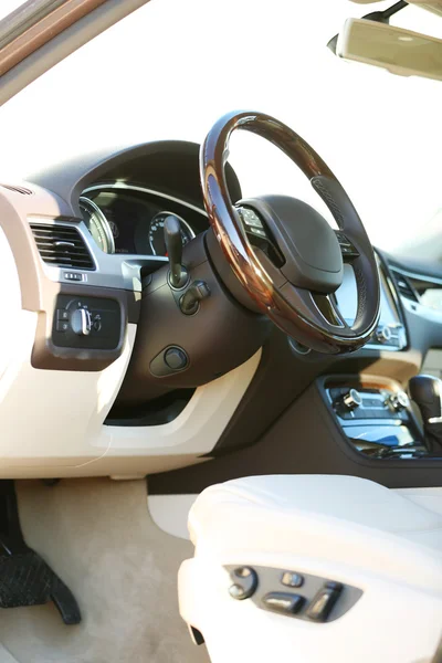 Interior view of car with beige salon and black dashboard — Stock Photo, Image