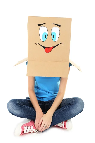 Woman with cardboard box on her head — Stock Photo, Image