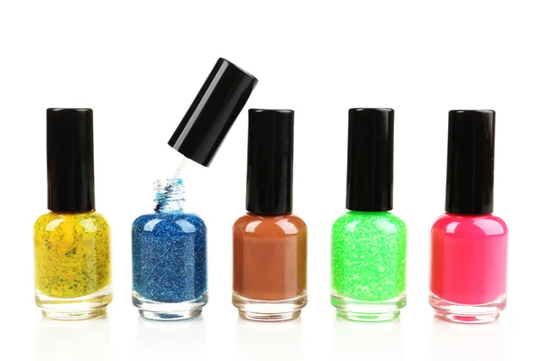 Kleurrijke nagel poetsmiddelen geïsoleerd op wit — Stockfoto