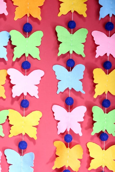 Handgemaakte garland met vlinders — Stockfoto