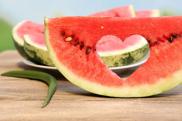 Fresh slice of watermelon on table outdoors, close up — Stock Photo, Image