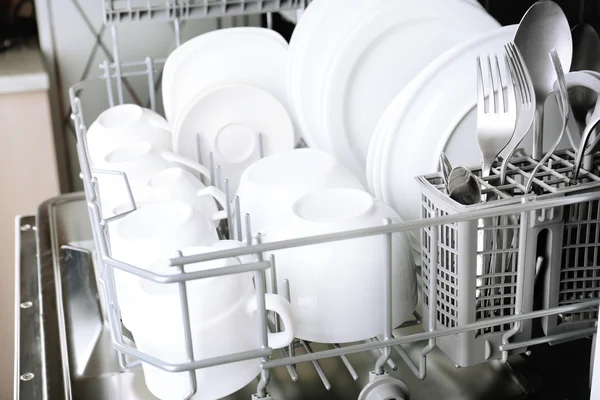 Dishwasher with clean utensils — Stock Photo, Image