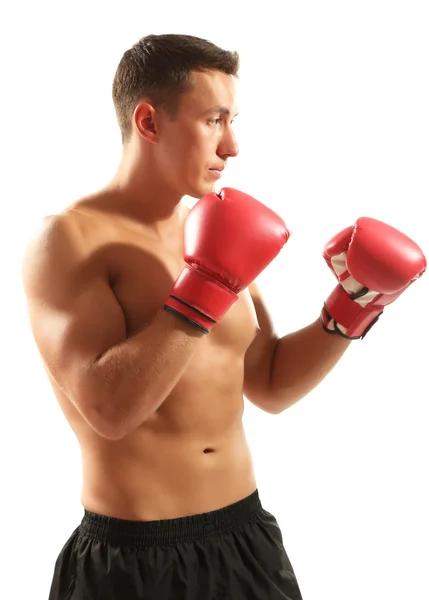 Bonito jovem desportista muscular com luvas de boxe isolado em branco — Fotografia de Stock