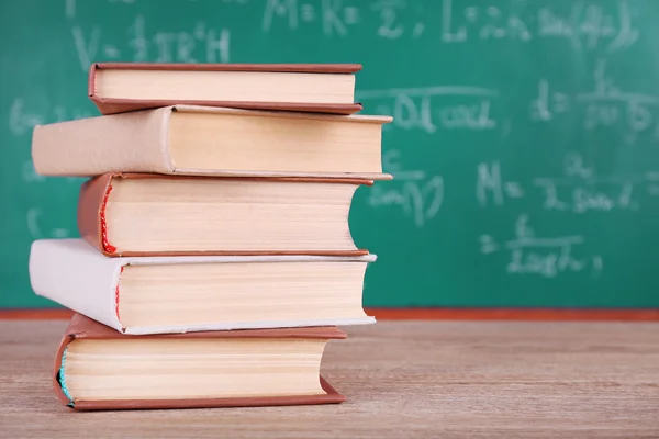 Books on wooden table — Stock Photo, Image