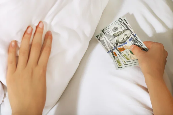 Woman hiding money