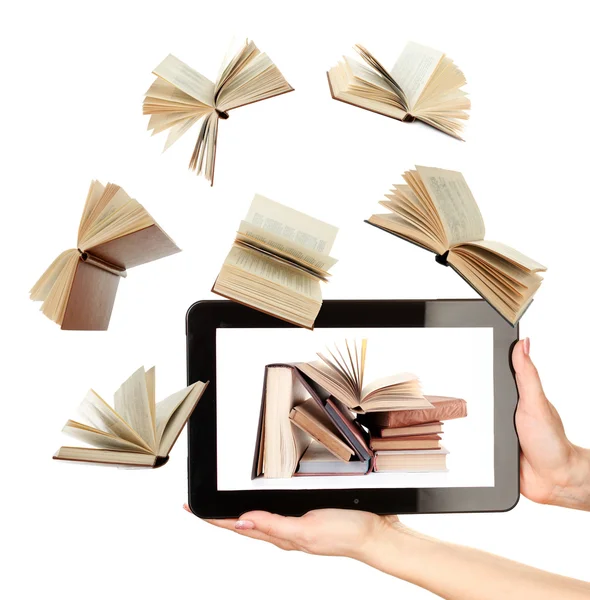 Livros voando em tablet — Fotografia de Stock