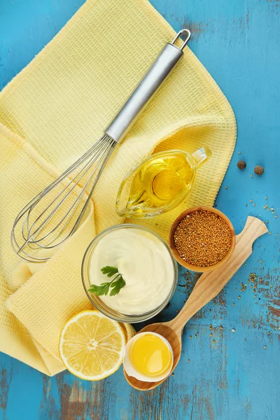 Mayonnaise ingredients on wooden background — Stock Photo, Image