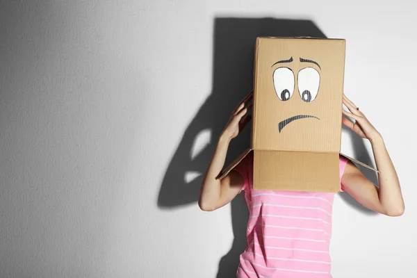 Woman with cardboard box — Stock Photo, Image