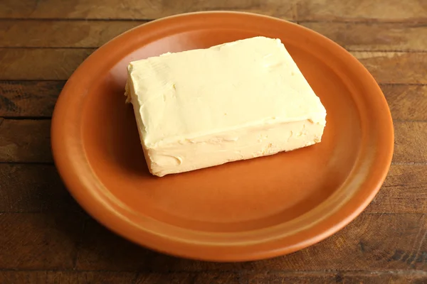 Fresh butter on plate — Stock Photo, Image
