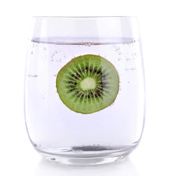 Kiwi in glass of water — Stock Photo, Image