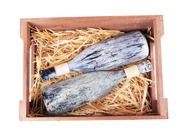 Botellas de vino en caja de madera, aisladas en blanco —  Fotos de Stock