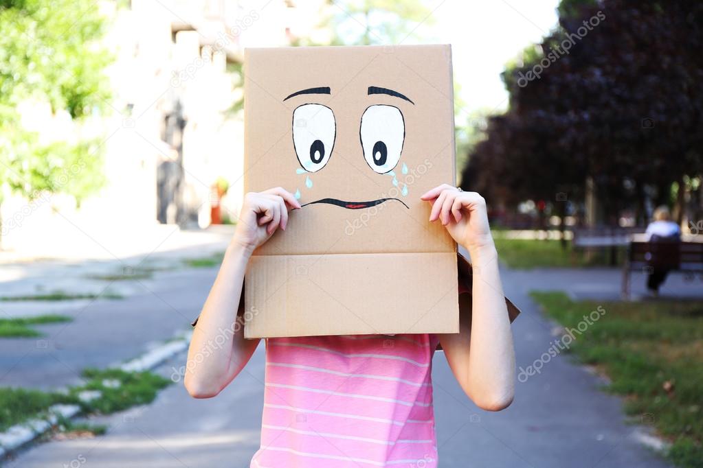 Woman with cardboard box