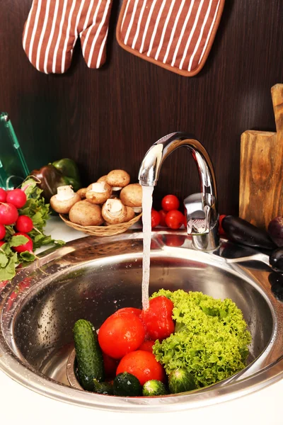 Fresh vegetables in sink — Stock Photo, Image