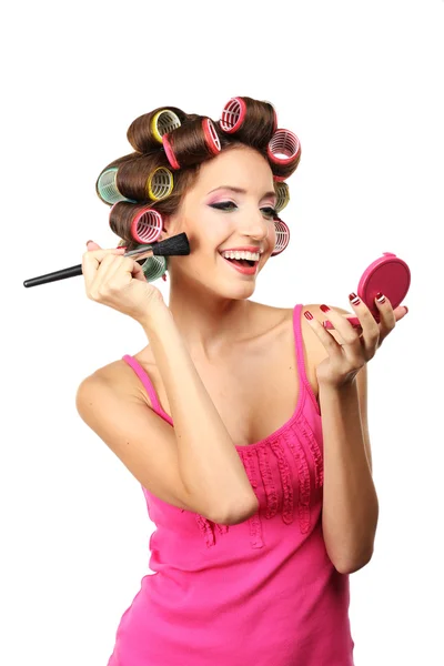 Beautiful girl in hair curlers isolated on white — Stock Photo, Image