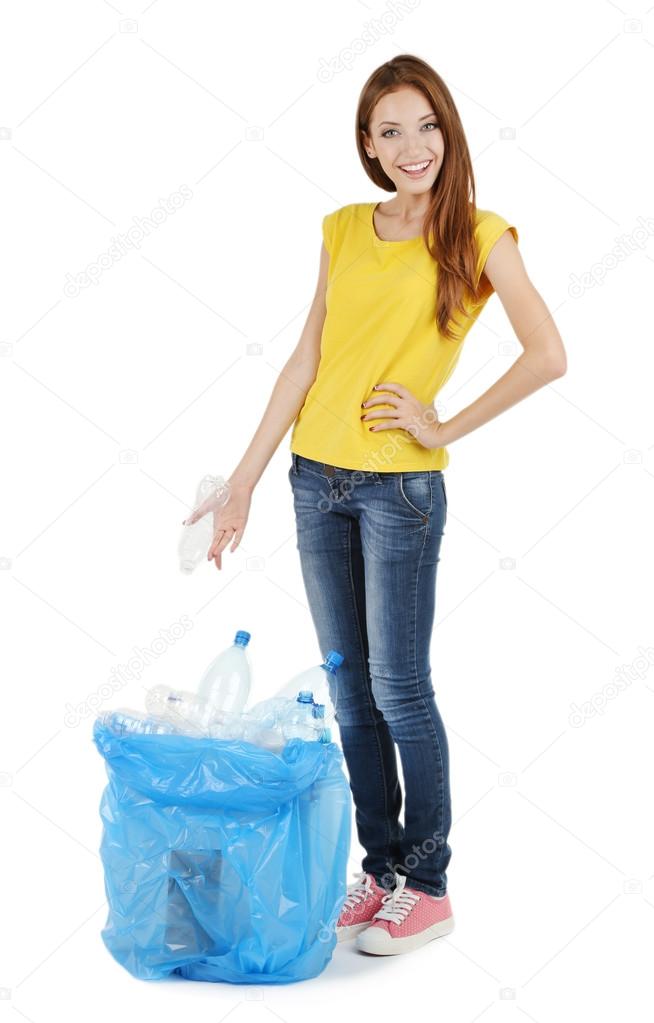 Young girl sorting plastic bottles