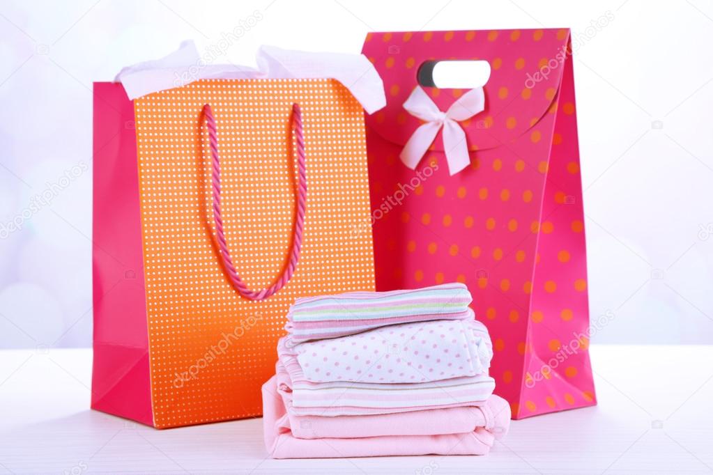 Baby clothes and gift bags