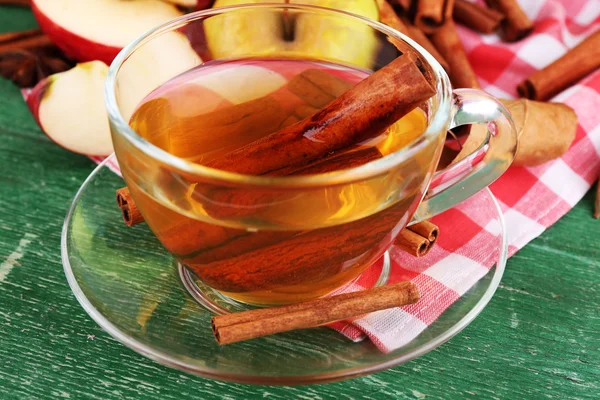 Apple cider with cinnamon sticks — Stock Photo, Image