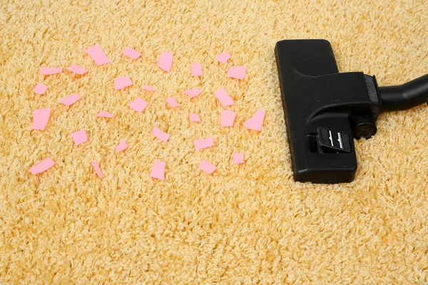 Vacuum cleaneron  carpet — Stock Photo, Image