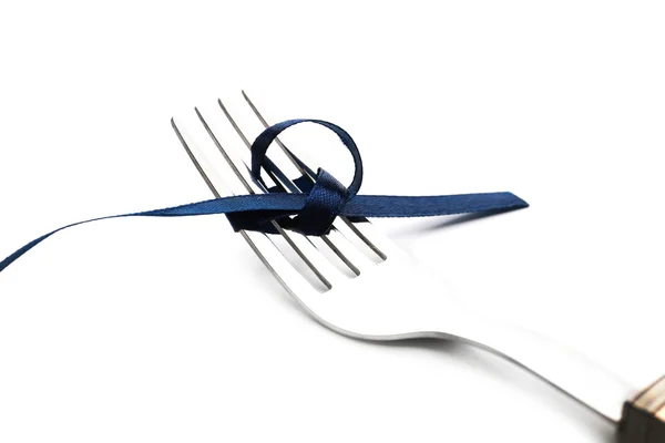 Tying bow on fork — Stock Photo, Image