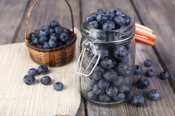 Fresh blueberries on wooden table — Stock Photo, Image