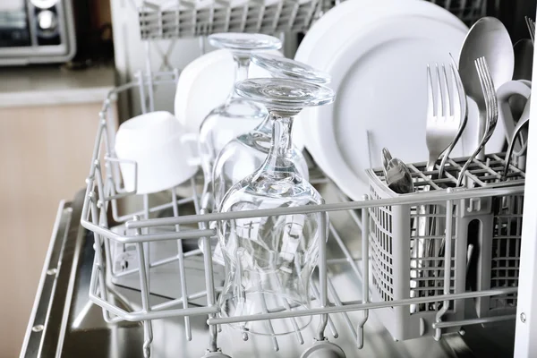 Dishwasher with clean utensils — Stock Photo, Image