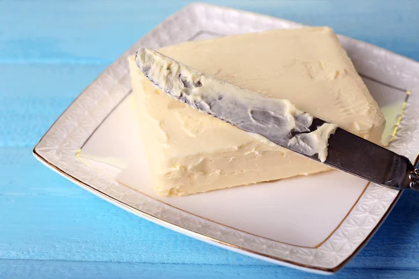 Fresh butter on plate — Stock Photo, Image