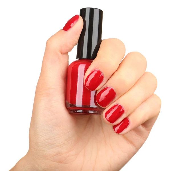 Nail polish in hand, close-up — Stock Photo, Image