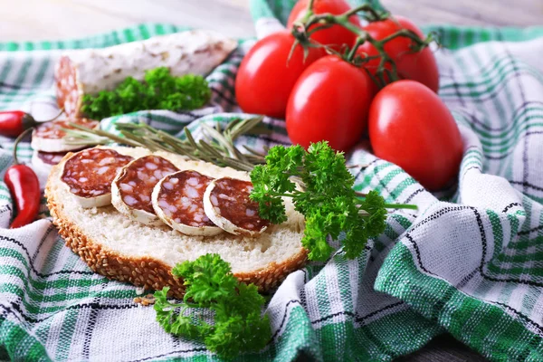 French salami with bread, tomatoes and parsley — Stock Photo, Image