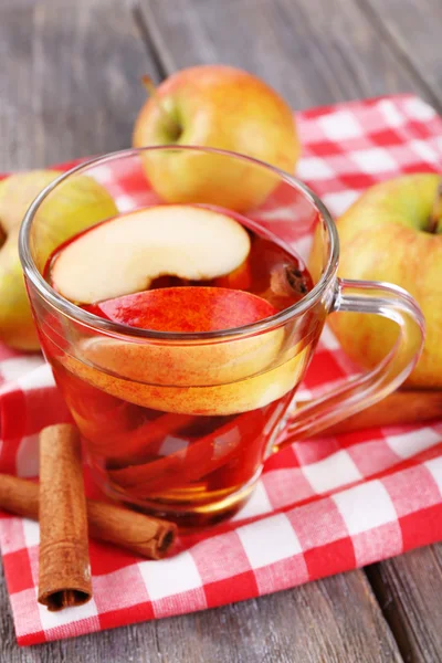 Apple cider with cinnamon sticks — Stock Photo, Image