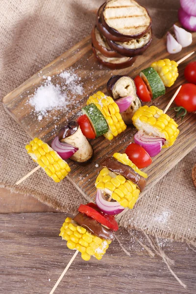 Sliced vegetables on wooden picks — Stock Photo, Image